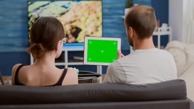 A split-screen image showing a Tier 2 team reviewing gameplay footage, while their coach provides feedback. The setting is a modest training room, highlighting the resource constraints they often face.