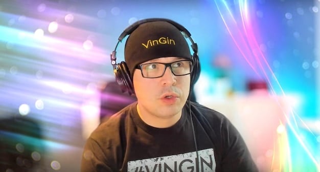 A collage of headshots of 4-5 of the most popular streamers participating in the event. Each streamer's name and Wild Rift main character should be included below their image.