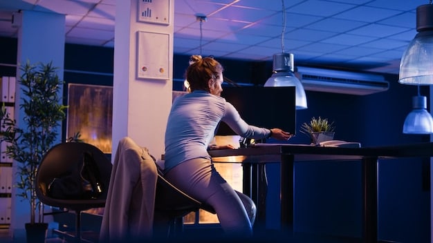 A person using a standing desk and doing light stretches while working on a laptop, illustrating how to integrate movement into a busy American work day.